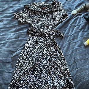 Cow print fitted dress. Brand in Enfocus Studio. Size 8